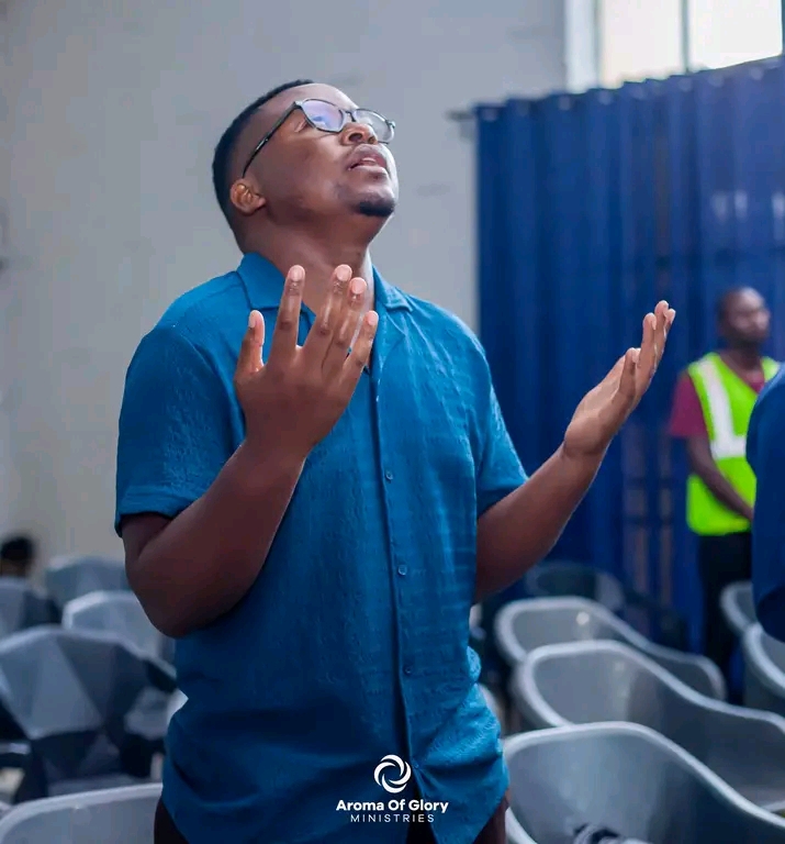 Congregation worship at Aroma of Glory Ministries